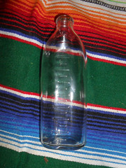 Vintage 1950s 1960s Unmarked Glass Embossed Laying Baby Nursing Bottle 8oz.