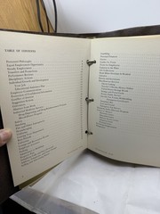 1976 Eli Lilly Employee Information binder – pay, insurance, credit union info