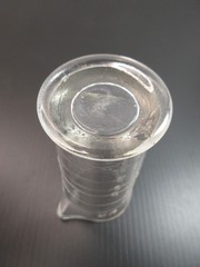 1930’s ENSIGN UK Footed Glass Embossed APOTHECARY MEASURE BEAKER Ounces & Drams