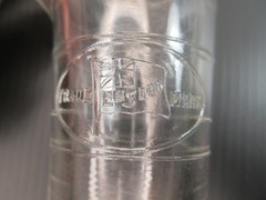 1930’s ENSIGN UK Footed Glass Embossed APOTHECARY MEASURE BEAKER Ounces & Drams