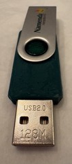 VTG NAMENDA USB FLASH DRIVE + LANYARD SET in METAL TIN PHARMA REP LOGO NEW