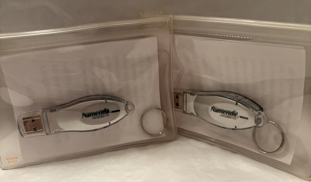 VTG LOT OF 2 NAMENDA USB FLASH MEMORY DEVICES + KEYRINGS PHARMA REP LOGO NEW