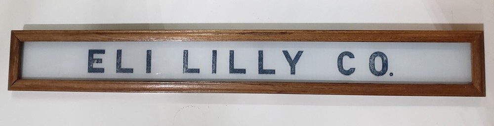 Vintage Eli Lilly Co. Milk White Glass Sign in Frame 6 3/4″ x 4 3/4″ GS00329