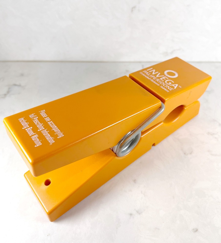 Medical Advertisement Promotional Invega Paliperidone XL Orange Clothespin Desk