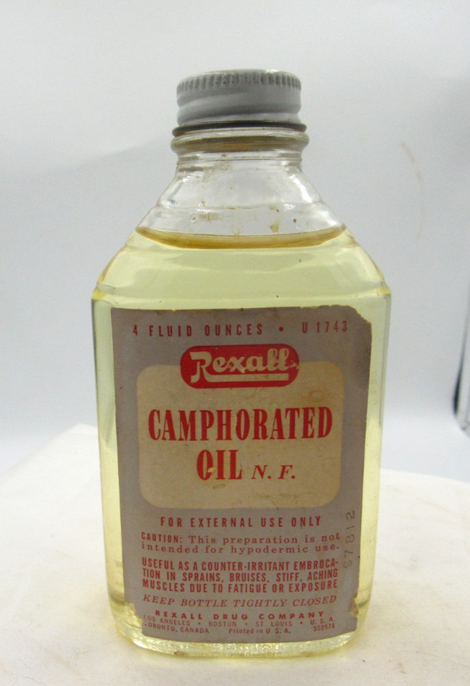 1940’s Rexall Caphorated Oil Los Angeles C 4 3/4 inch tall Clear Medicine Bottle