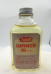 1940’s Rexall Caphorated Oil Los Angeles C 4 3/4 inch tall Clear Medicine Bottle