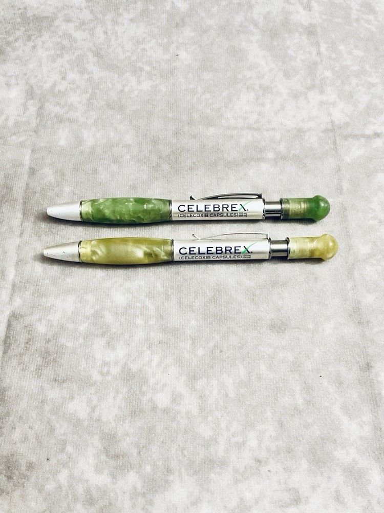 CELEBREX PHARMACEUTICAL REP PEN MARBLED BARREL YELLOW GREEN CHROME CLIP LOT OF 2