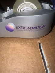 ONE EXELON PATCH DRUG REP PROMO HEAVY WEIGHTED TAPE DISPENSER