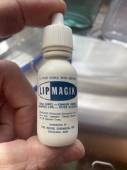 Vintage Bottle Of LIP MAGIK. Full*Unopened Bottle In Original Cont. W/cotton.