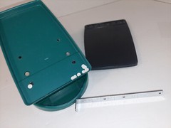 Namenda Pharmaceutical Drug Rep Green Two Hole Paper Punch Plastic Advertising