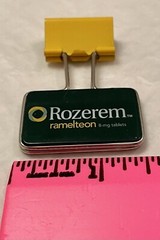 VINTAGE ROZEREM GREEN/YELLOW BINDER CLIP PHARMACEUTICAL DRUG REP LOGO NEW