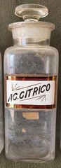 A LOT OF FOUR WT&CO CLEAR GLASS PHARMACY BOTTLES.GLASS LABELS
