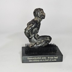 Vintage Proctofoam Pharmaceutical Advertising Bed Of Nails Fakir Figure