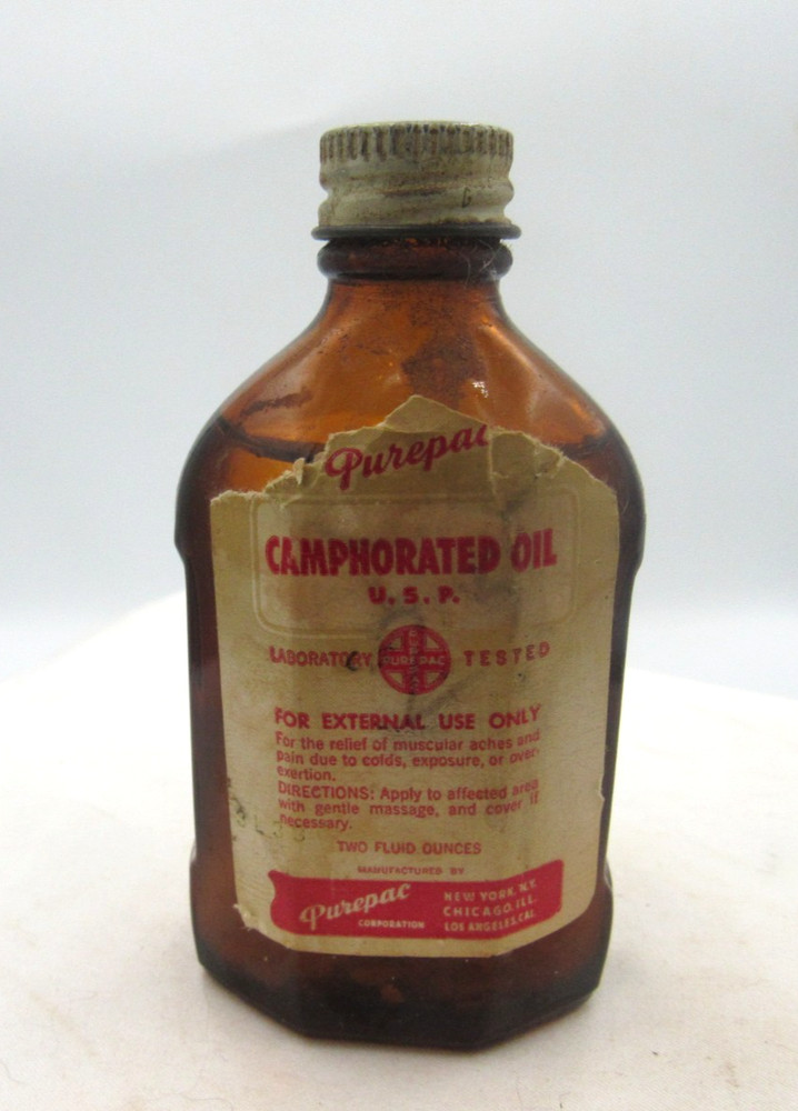 1940’s Purepac Caphorated Oil New York 3 5/8 inch tall Amber Medicine Bottle