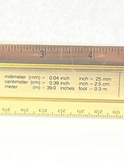 VINTAGE RITALIN CIBA 12″ METAL RULER! mm/METRIC CONVERSIONS! GOLD COLOR METAL!