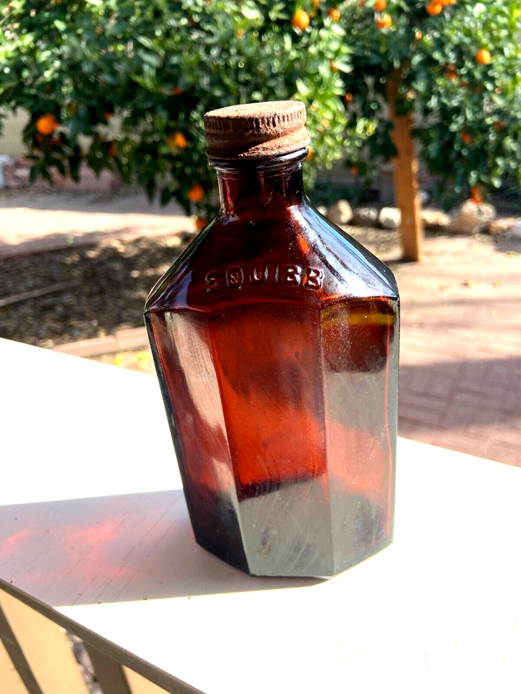 BEAUTIFUL Antique Amber Squibb embossed Glass Drug or Pharmacy Jar, 7“ Tall