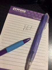 Zyprexa early 2000s collectible merch, 3 different pens, level, and mug