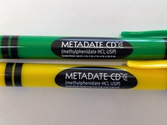 RARE Metadate CD CII Pharmaceutical Drug Rep Pen ADHD Green Yellow Crayon Click
