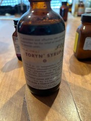 4 glass medicine bottles, Thyroid, Iodin ration, Pyridium Tri-Sulfa, Toryn Syrup