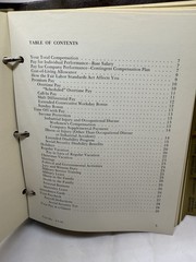 1976 Eli Lilly Employee Information binder – pay, insurance, credit union info