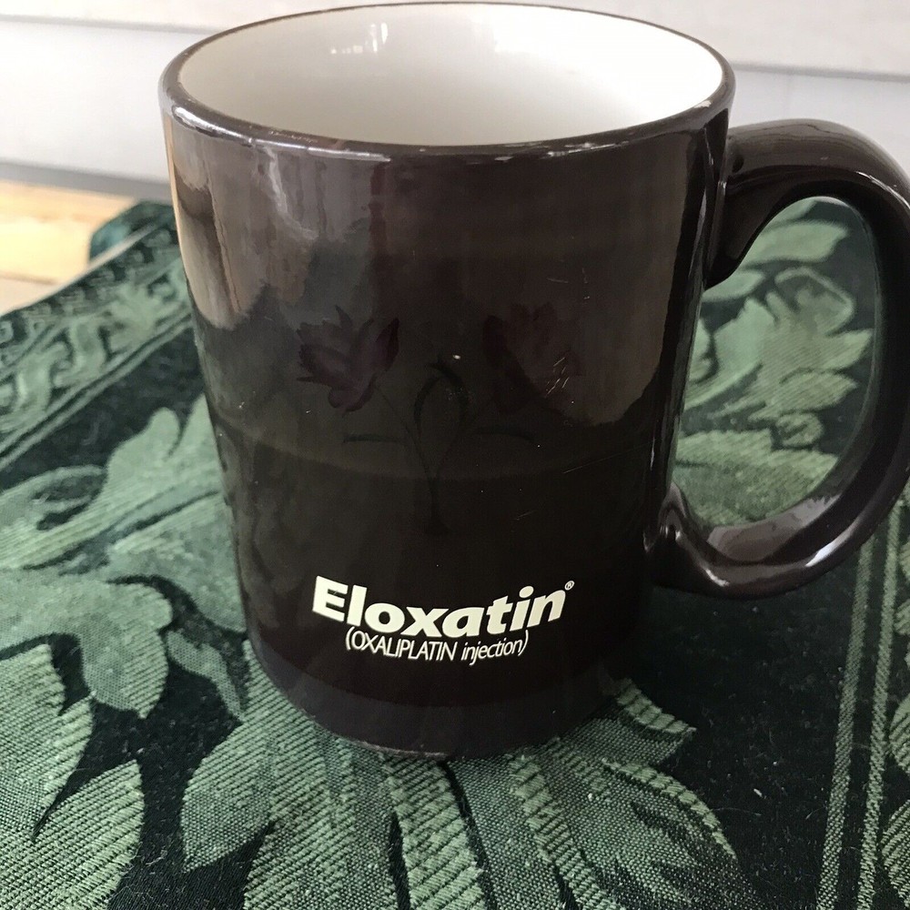 Eloxatin Pharmaceutical Cup Dark With Floral Design 4 1/2″ Tall