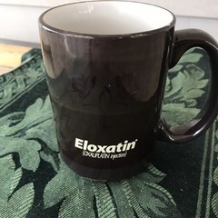 Eloxatin Pharmaceutical Cup Dark With Floral Design 4 1/2″ Tall