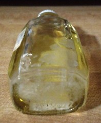 Vtg CUNNINGHAM Sweet Oil Emollient 1oz Glass Mini Glass Bottle 3/4 Full PROP TAG
