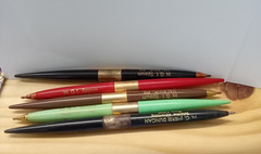 vintage pharmaceutical advertisement, writing pen holder with original pens