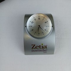 ZETIA Pharmaceutical Spinning Clock W/ Original Box & Directions desk clock