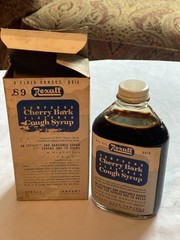 c1950s Compound Cherry Bark flavored Cough Syrup Rexall Drug Company Bottle