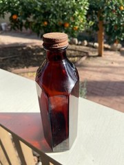BEAUTIFUL Antique Amber Squibb embossed Glass Drug or Pharmacy Jar, 7“ Tall