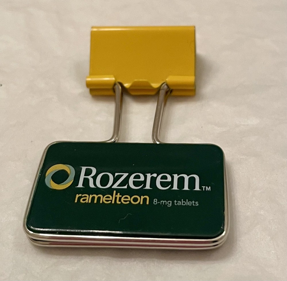 VINTAGE ROZEREM GREEN/YELLOW BINDER CLIP PHARMACEUTICAL DRUG REP LOGO NEW