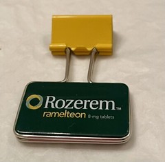 VINTAGE ROZEREM GREEN/YELLOW BINDER CLIP PHARMACEUTICAL DRUG REP LOGO NEW