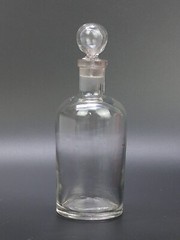 Antique clear medicine bottle with stopper medium size