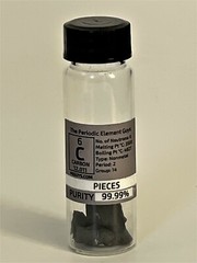 Carbon Graphite Pieces in New „Stand Tall Glass Vial