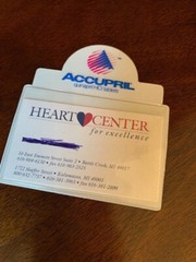 Drug Rep Accupril Flashlight, magnetic business card holder, and 3 magnets.