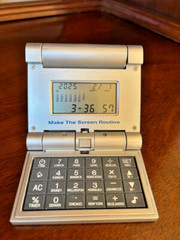 „Drug rep AndroGel“ travel alarm clock/calculator/timer/with 7Alarms