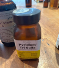 4 glass medicine bottles, Thyroid, Iodin ration, Pyridium Tri-Sulfa, Toryn Syrup