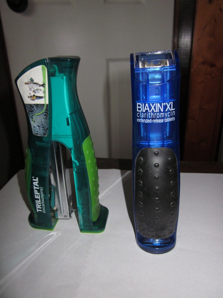 LOT OF 2 RARE DRUG REP STAPLERS, TRILEPTAL AND BIAXIN XL.