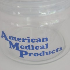 American Medical Products Promo Clear Glass Jar Blue Writing 6″ VTG Retro