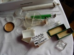 Collection interestesting scientific glassware dishes, slides, tubes