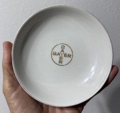 Vtg Bayer Haus Pharmacy Advertisement Promo Porcelain Dish Gold Cross Logo 1952