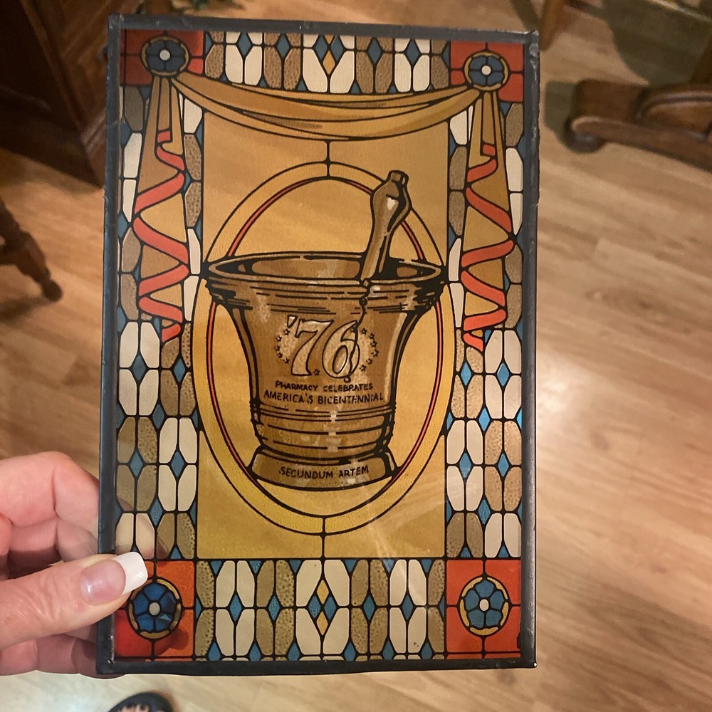 SECUNDUM ARTEM ’76, PHARMACY CELEBRATES AMERICA’S BICENTENNIAL STAINED GLASS