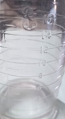 Vintage Apothecary Embossed Footed Measuring Heavy Glass Cup w/ Spout – 16 Oz.