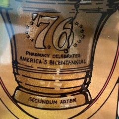 SECUNDUM ARTEM ’76, PHARMACY CELEBRATES AMERICA’S BICENTENNIAL STAINED GLASS