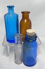 Vtg Blue Brown & Clear Drug Store Pharmaceutical Mini Decorator Lot Of 4 Bottles