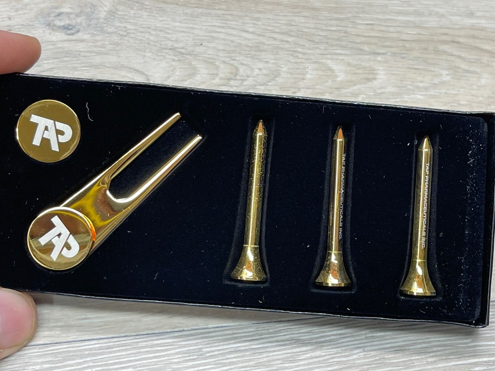 TAP Pharmaceuticals Drug Rep Promotional Golf Tees, Ball Marker, And Divot Tool.