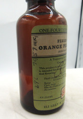 BW – 1940’s Eli Lilly Orange Peel Indianapolis Ind 5 1/4″ Amber Medicine bottle
