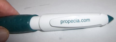 Propecia Finasteride Promotional Plastic Pen – Short 4″ Rubber Grip/Clip Logo