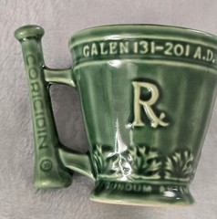 Schering Coricidin RX Pharmaceutical Promo Coffee Mug Green Galen 131-201 A.D.